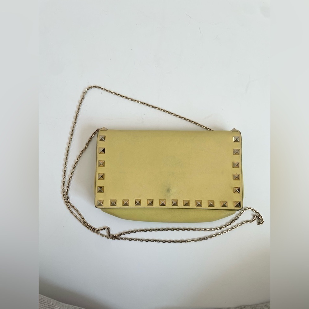 Valentino Garavani light yellow rockstud single pocket flap crossbody bag